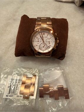 Michael Kors Runway woman’s rose gold stainless steel watch